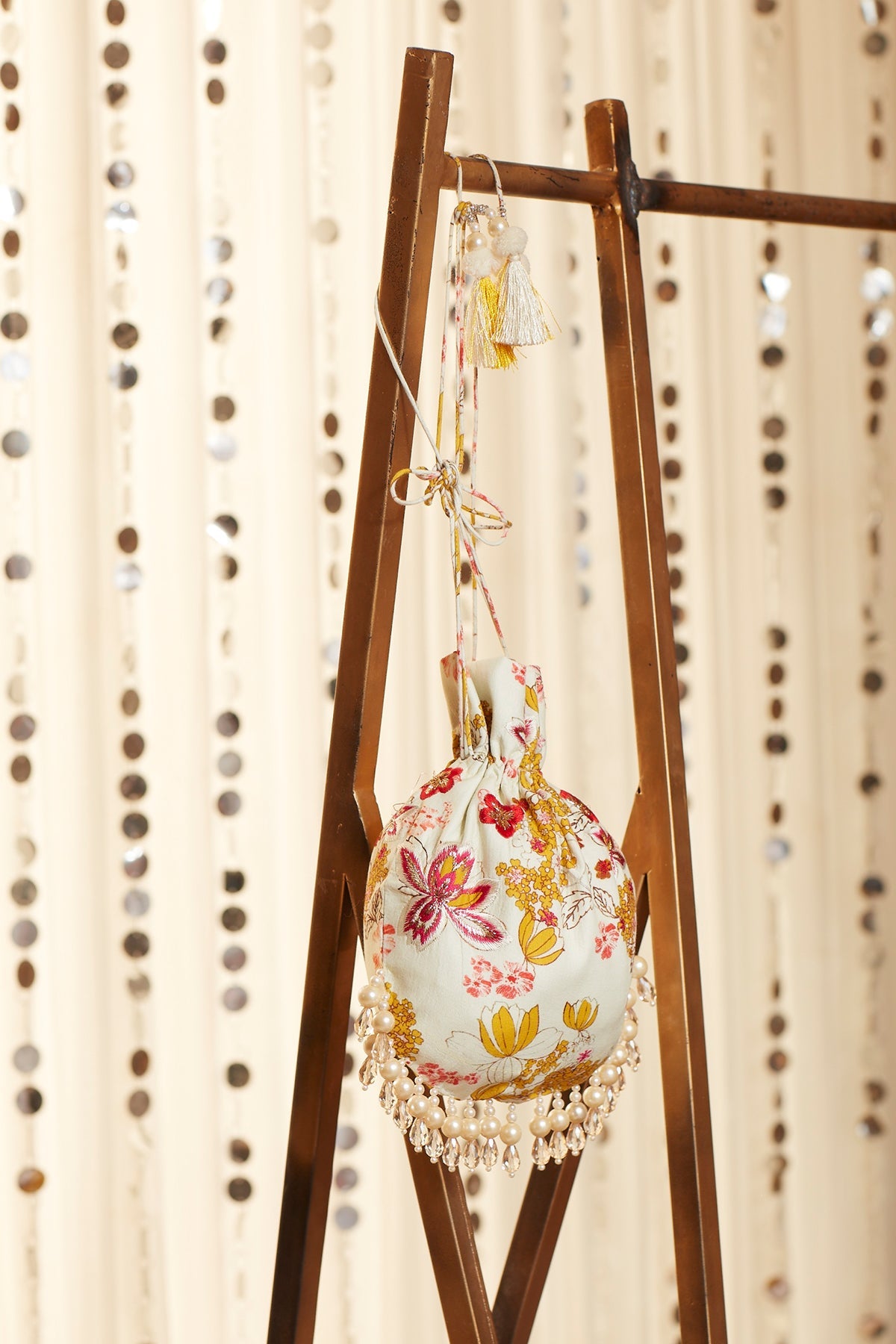 Printed Potli With Pearl And Crystal Hangings - ajieshoberoi